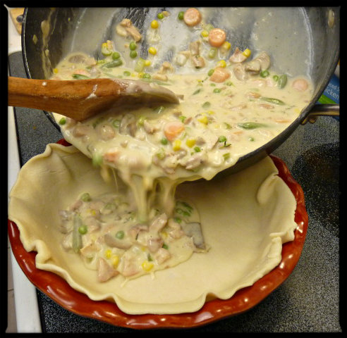 Adding the pot pie filling 